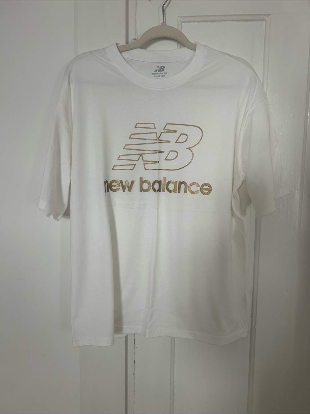 New Balance White Short-Sleeve Tee with Gold Logo